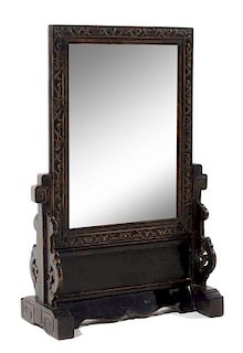 A Hardwood Mirror Height 30 7/8 inches.