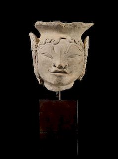 A Javanese Terracotta Head of a Female Height 6 1/2 inches.