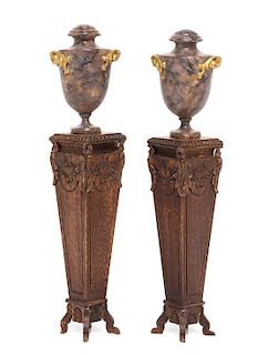 A Pair of Neoclassical Style Carved Pedestals with Faux Marble Urns, Height of pedestals 3 1/2 inches.