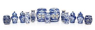 Thirteen Chinese Style Blue and White Porcelain Articles, Height of tallest 1 1/2 inches.