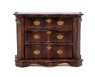 A Chippendale Style Chest of Drawers, Height 2 7/8 x width 4 x depth 1 1/2 inches.