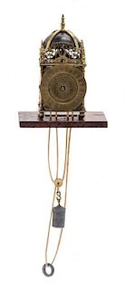 A Brass Lantern Clock, Height of clock 1 1/4 inches.