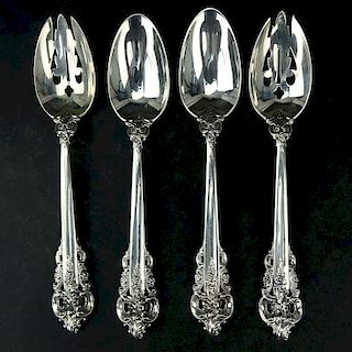 Collection of Four (4)  Wallace "Grand Baroque" Sterling Silver Serving Spoons.
