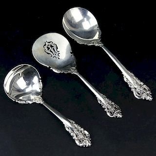 Collection of Three (3) Wallace "Grand Baroque" Sterling Silver Serving Spoons.