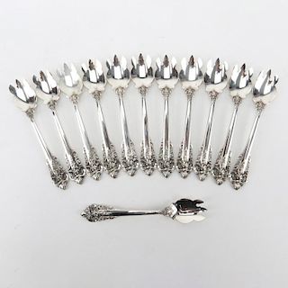 Set of Twelve (12) Wallace "Grand Baroque" Sterling Silver Ice Cream Forks.