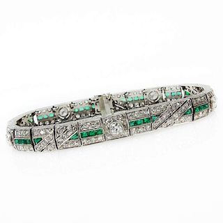 Circa 1920s Art Deco Approx. 5.50 Carat Diamond, 2.0 Carat Emerald and Platinum Bracelet.