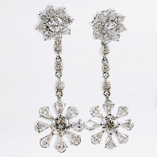 Approx. 7.0 Carat Round Brilliant, Pear and Princess Cut Diamond and 14 Karat White Gold Chandelier Earrings.