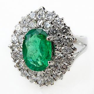 Approx. 2.16 Carat Oval Cut Emerald, 1.76 Carat TW Diamond and 18 Karat White Gold Ring.