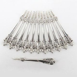 Set of Twelve (12) Wallace "Grand Baroque" Sterling Silver One Tine Butter Picks.