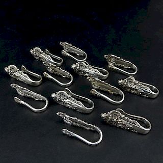 Set of Twelve (12) Wallace "Grand Baroque" Sterling Silver Napkin Clips.