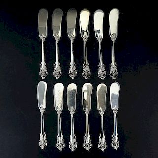 Set of Twelve (12) Wallace "Grand Baroque" Sterling Silver Butter Spreaders.