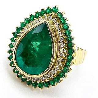 Approx. 7.50 Carat Pear Shape Colombian Emerald and 18 Karat Yellow Gold Ring Accented throughout with Approx. .50 Carat Diam