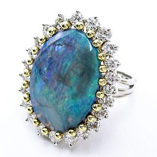 Vintage Approx. 9.0 Carat Oval Cut Opal, 2.0 Carat Round Brilliant Cut Diamond and 18 Karat White and Yellow Gold Ring. Diamo