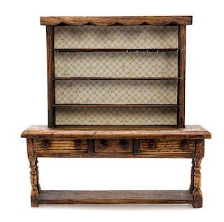 An Oak Welsh Dresser, Height 11 5/8 x width 11 1/4 x depth 2 1/8 inches.