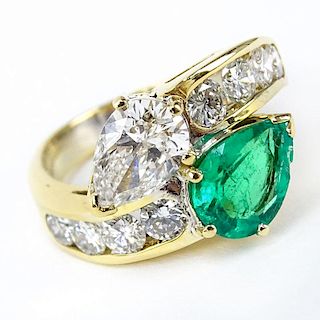 Vintage Approx. 1.18 Carat Pear Shape Diamond, 1.50 Carat Pear Shape Colombian Emerald and 18 Karat Yellow Gold Ring Accented