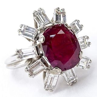 Vintage Oval Cut Ruby, Approx. 2.0 Carat Emerald Cut Diamond and Platinum Ring.