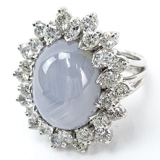 Vintage Approx. 22.0 Carat Oval Cabochon Star Sapphire, 4.0 Carat Round Brilliant Cut Diamond and Platinum Ring.