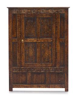 An Elizabethan Style Armoire, Height 6 x width 4 1/2 x depth 1 7/8 inches.