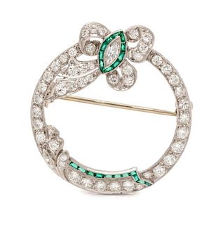 An Art Deco Platinum, Diamond and Simulated Emerald Circle Brooch, 4.90 dwts.