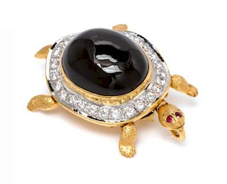 A Yellow Gold, Onyx, Diamond and Ruby Articulated Turtle Pendant/Brooch, 9.30 dwts.