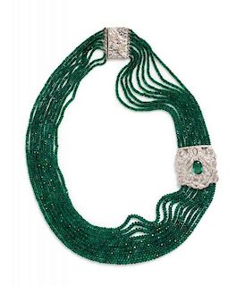An 18 Karat White Gold, Diamond and Emerald Multistrand Bead Necklace, 53.80 dwts.