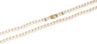 An 18 Karat Yellow Gold, Diamond and Cultured Pearl Necklace, 42.50 dwts.