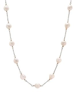 A 14 Karat White Gold and Cultured Pearl Station Necklace, u8.00 dwts.