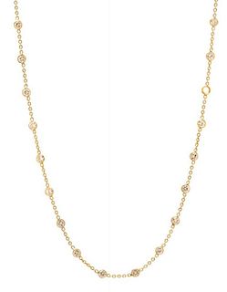 A Yellow Gold and Diamond Station Necklace, 4.40 dwts.