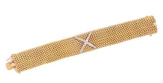 A 14 Karat Bicolor Gold and Diamond Bracelet, 53.30 dwts.