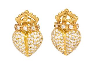 A Pair of 18 Karat Yellow Gold and Diamond Earclips, 12.00 dwts.