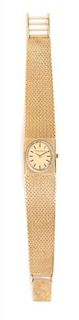 A 14 Karat Yellow Gold Wristwatch, Lucien Piccard, 36.10 dwts.