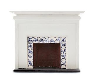 A Dutch Style Porcelain Mounted Hearth, Height 5 x width 6 1/4 x depth 2 1/8 inches.