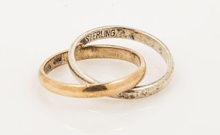 An 18 Karat Yellow Gold and Sterling Silver Rolling Ring, Tiffany & Co. 1.75 dwts.