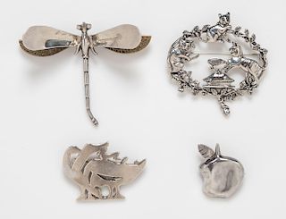 A Collection of Sterling Silver Brooches, 41.80 dwts.