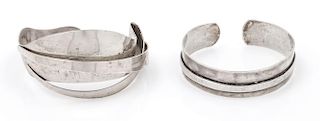 A Collection of Sterling Silver Cuff Bracelets, 39.60 dwts.