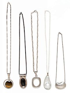 A Collection of Silver Pendant Necklaces 78.50 dwts.