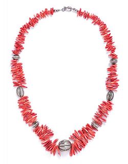 A Sterling Silver and Graduated Coral Bead Necklace, 62.40 dwts.