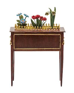 A Directoire Style Gilt Metal Mounted Jardiniere Table, Height of table 2 3/4 x width 2 1/2 x depth 1 inch.