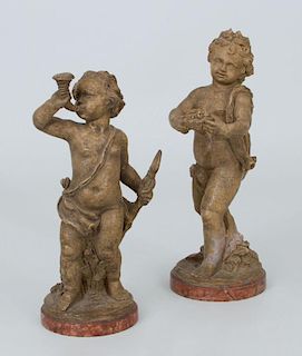 Two Continental Molded Terracotta Figures of Putti