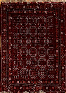 Turcoman Claret-Ground Carpet and a Pakistan Carpet