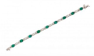 A 14 Karat White Gold, Emerald and Diamond Bracelet, 8.10 dwts.