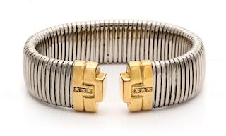 An 18 Karat Bicolor Gold Cuff Bracelet, 32.00 dwts.
