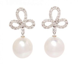 A Pair of White Gold, Cultured South Sea Pearl and Diamond Drop Earrings, 7.40 dwts.