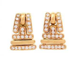 A Pair of 18 Karat Yellow Gold and Diamond Earclips, Schluger, 13.60 dwts.