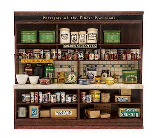 * An English Store Display Diorama, Height 8 x width 8 7/8 x depth 1 7/8 inches.