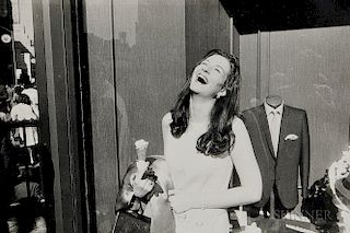 Garry Winogrand (American, 1928-1984)      Laughing Woman with Ice Cream Cone