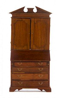 * An American Mahogany Secretary Bookcase, Height 7 x width 3 3/8 x depth 1 7/8 inches.
