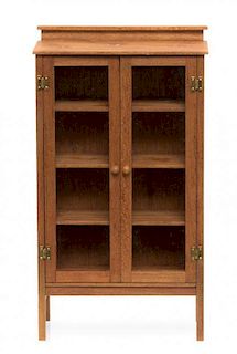 * An Arts & Crafts Style Vitrine Cabinet, Height 5 1/4 x width 3 x depth 1 1/4 inches.