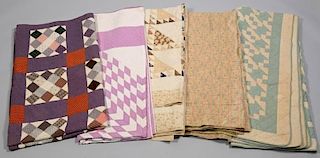Group of 5 quilts, 1 signed