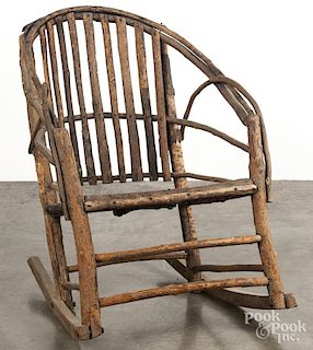 Primitive Adirondack rocking chair.